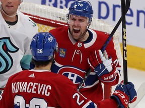 Canadiens' Tanner Pearson is seen screaming with joy in the face of teammate Johnathan Kovacevic after scoring against the Kraken at the Bell Centre in early December.