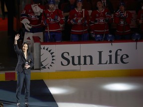 Hockey Hall of Famer Caroline Ouellette is saluted by players and the Bell Centre crowd during ceremony before the Canadiens played the Kings on Thursday, Dec. 7.