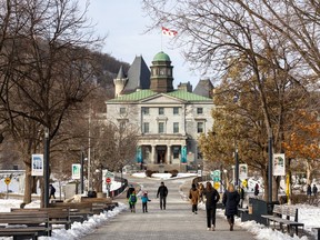 Students are shown walking on the snowy campus of McGill University in downtown Montreal.