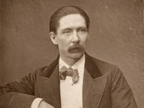 1800s portrait of a man in a bow tie.