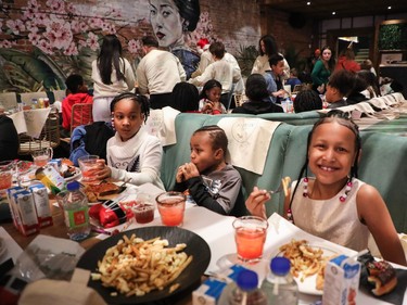 Youngsters enjoy the offerings at an event called One Magic Moment in Montreal on Sunday, Dec. 17, 2023.