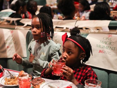 Brielle Joseph (right) and Samaya Sutton enjoyed the food and drink at an event called One Magic Moment in Montreal on Sunday, Dec. 17, 2023.