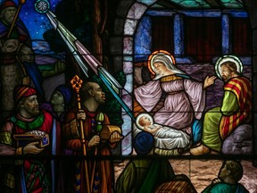 A stain glass window depicts the nativity scene at a Montreal church.