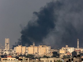 Smoke billows over Khan Yunis in the southern Gaza Strip.