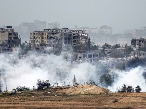 Smoke rises over Beit Hanoun in Northern Gaza after an Israeli air strike on Nov. 22, 2023.