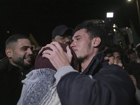 Palestinian prisoner Mohammad Hamamreh is greeted after being released in the West Bank town of Ramallah, early Wednesday Nov. 29, 2023.