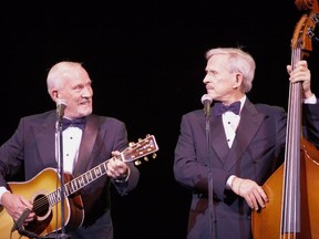 The Smothers Brothers — Tom, left, and Dick — perform in Richmond, B.C., in 2015.