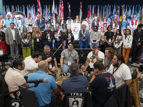 The Eastern Eagles Mi'kmaq drumming group performs at the beginning of the AFN annual general assembly, in Halifax, Tuesday, July 11, 2023.