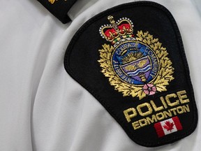 An Edmonton Police Service shoulder badge is seen in Edmonton Alberta on Tuesday Aug. 1, 2023.