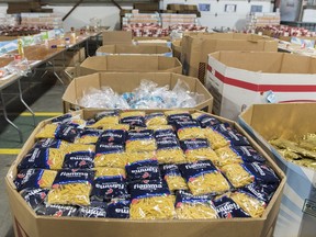 Boxes of donated food items are shown at the Moisson Montréal food bank in Montreal on Dec. 7, 2019.