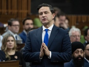 Conservative leader Pierre Poilievre rises during Question Period, Thursday, Nov. 30, 2023 in Ottawa.