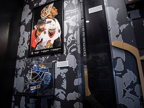 An image with current Ottawa Senators player Anthony Duclair and former players Ray Emery and Johnny Oduya is shown along the helmet of Grant Fuhr and stick of Reggie Savage are shown in the NHL's Black Hockey History Mobile Museum, an initiative for Black History Month in Ottawa on Feb. 3, 2020.