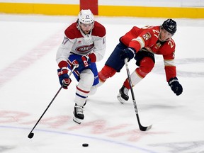 Canadiens' Josh Anderson (17) skates against Florida Panthers centre Eetu Luostarinen (27) on Saturday, Dec. 30, 2023, in Sunrise, Fla.