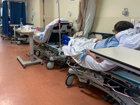 Patients in beds in the hallway in the emergency department of a Montreal area hospital in 2020.