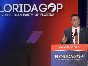 Florida Party of Florida Chairman Christian Ziegler addresses attendees at the Republican Party of Florida Freedom Summit, Nov. 4, 2023, in Kissimmee, Fla. The Republican Party of Florida suspended Ziegler and demanded his resignation during an emergency meeting Sunday, Dec. 17, adding to calls by Gov. Ron DeSantis and other top officials for him to step down as police investigate a rape accusation against him.