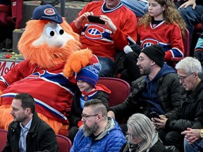 Montreal Canadiens fans attending games at the Bell Centre can ensure they get a personalized visit at their seat from mascot Youppi! -- as long as they're willing to pay nearly $200 for the privilege. Montreal Canadiens mascot Youppi sits with fans during an NHL hockey game in Montreal, on Dec. 4.
