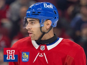 A hockey player wearing a neck guard