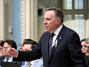 François Legault gestures at the National Assembly.