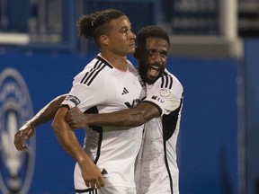 D.C. United forward Erik Hurtado (left) celebrates his goal with teammate Ruan during second half Leagues Cup soccer action against CF Montreal on Wednesday, July 26, 2023 in Montreal. CF Montreal acquired defender Ruan and $500,000 in 2024 general allocation money from D.C. United in exchange for defender Aaron Herrera on Tuesday.