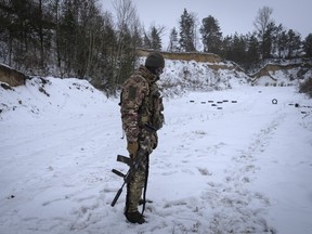 A member of the pro-Ukrainian Russian ethnic Siberian Battalion practises.