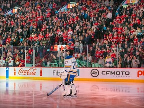 Devon Levi stands on the ice with thousands of Canadiens fans in the stands of the Bell Centre