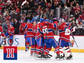 Montreal Canadiens players gather on the ice to celebrate a win in front of their cheering fans