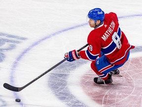 Canadiens defenceman Mike Matheson is seen crossing centre ice at the Bell Centre with the puck on his stick.