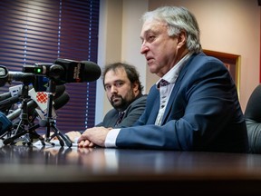 Jean-Pierre Daubois, right, plaintiff in a lawsuit against the CHSLD Sainte-Dorothée, attends press conference with his lawyer, Patrick Martin-Ménard, in Montreal on Tuesday, Jan. 23, 2024.
