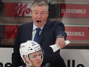 Islanders coach Patrick Roy yells out to his players during first-period action Thursday night at the Bell Centre.