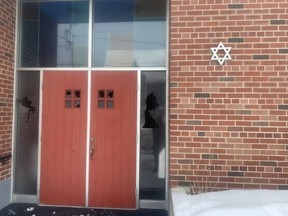 Glass panes at the front doors of the Sgoolai Israel Synagogue in downtown Fredericton were smashed sometime overnight Saturday, Jan. 27, 2024.