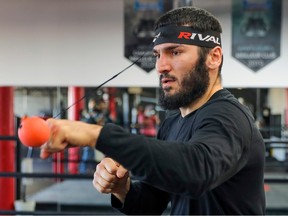 Boxer Artur Beterbiev punches a ball on a tether