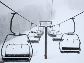 A view of empty ski chair lift at Squaw Valley Resort on March 14, 2020, in Olympic Valley, Calif.
