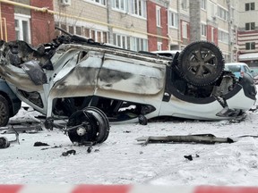 A destroyed car following a missile strike in Belgorod.