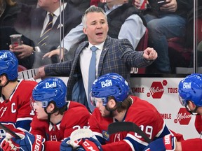 Martin St. Louis gestures and yells behind the Canadiens bench