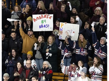 Fans cheers for Montreal during the PWHL home opener against Boston at the Verdun Auditorium in Montreal on Saturday, Jan. 13, 2024.