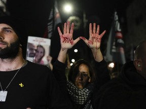 Relatives and supporters of the Israeli hostages held in the Gaza Strip by the Hamas militant group attend a protest.