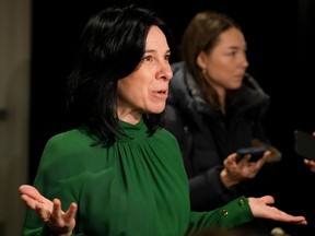 Valérie Plante gestures while speaking to journalists