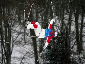 Quebec's Mikaël Kingsbury competes in the men's World Cup freestyle moguls skiing competition on Friday, Jan. 26, 2024, in Waterville Valley, N.H.