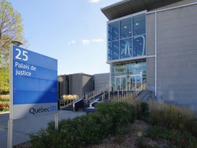 The sign outside the courthouse in St-Jérôme is seen.