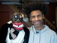 Artist Franck Sylvestre poses with puppet Max at his home in Montreal, Saturday, March 18, 2023.