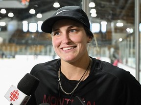 Montreal's Marie-Philip Poulin speaks to media following the Professional Women's Hockey League's (PWHL) training camp in Montreal, Saturday, Nov. 18, 2023.