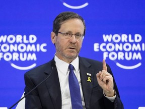 Israel's President Isaac Herzog speaks at the World Economic Forum in Davos, Switzerland, Jan. 18, 2024. Israel's president on Sunday, Jan. 28, 2024 accused the UN world court of misrepresenting his words in a ruling that ordered Israel to take steps to protect Palestinians and prevent a genocide in the Gaza Strip.