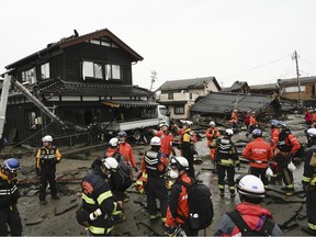 Firefighters and police search coastal area hit by earthquakes in Suzu, Ishikawa prefecture, Japan on Wednesday, Jan. 3, 2024.