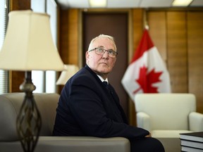 Bill Blair is shown in his office at National Defence Headquarters in Ottawa, on Wednesday, Aug. 2, 2023.