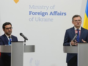 Ukraine Foreign Minister Dmytro Kuleba, right, and his French counterpart Stéphane Séjourné attend a joint press conference in Kyiv, Ukraine.