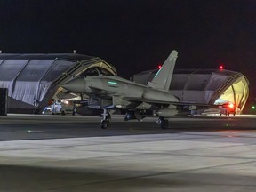 An RAF Typhoon aircraft returns to base at RAF Akrotiri in Cyprus.