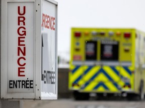 A sign reads 'urgence' near an ambulance