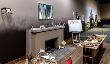 A re-creation of Georgia O'Keeffe's studio containing personal collections of found objects, furnishings.