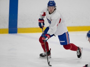 Rocket's RIley McKay is seen with his stick on the ice during practice last season.