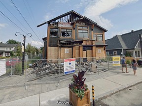 Google streetview image of a building badly damaged by fire.